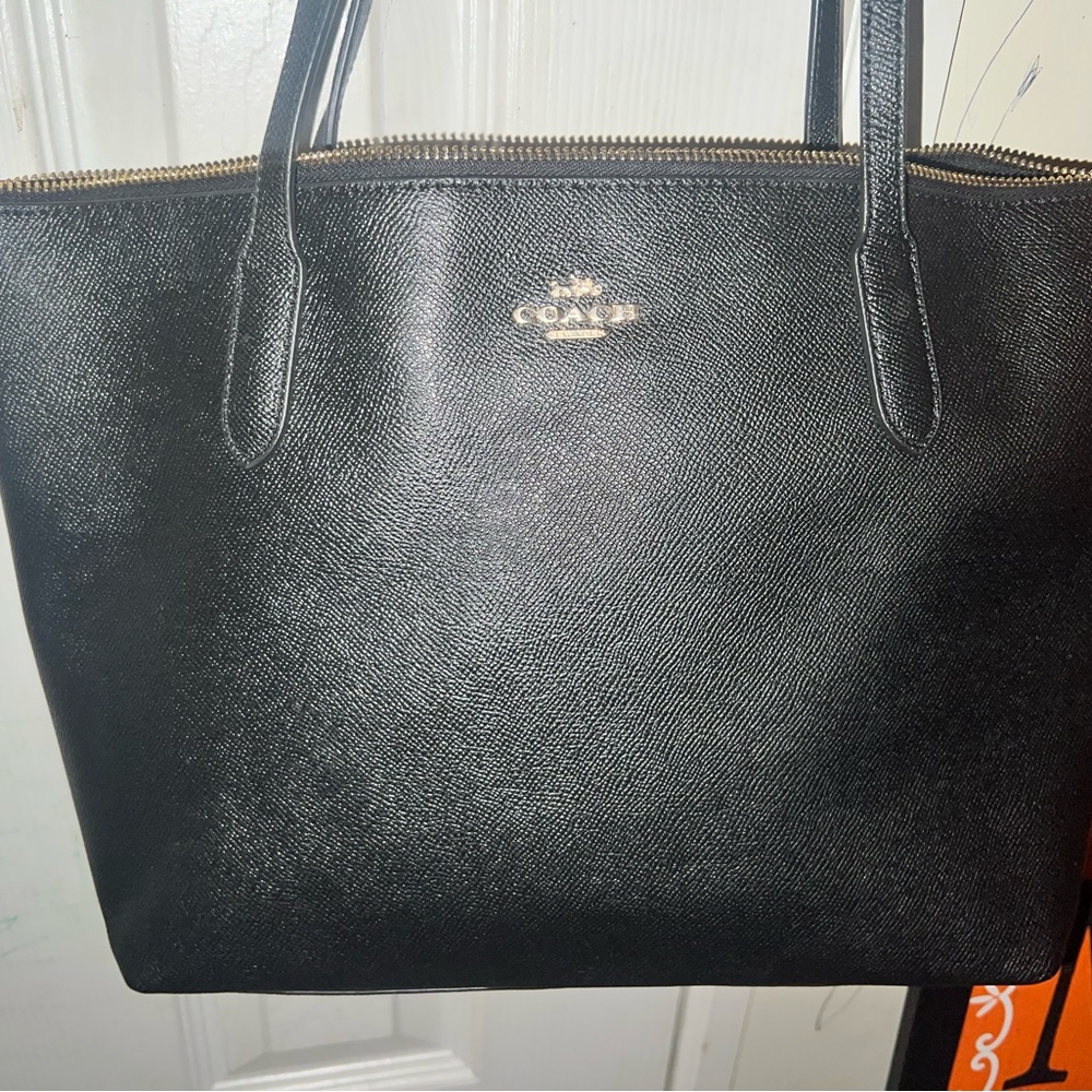 Coach Bag! No rips, No stains! Had for almost a year and carried a few times!